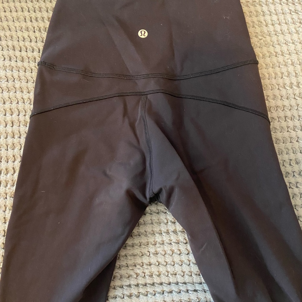 Lululemon black leggings size 4